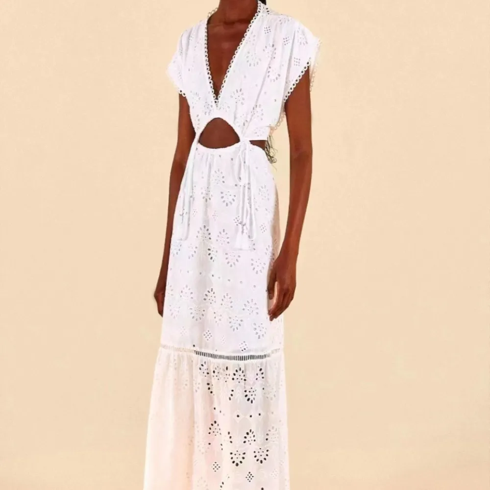 2023 Nuovo stile estivo francese Hollow dimagrante Lace-up vita abito da donna senza maniche gonna a trapezio gonna lunga temper